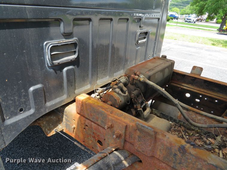 image for item DE8243 2005 Ford F450 Super Duty XL Crew Cab flat dump bed truck