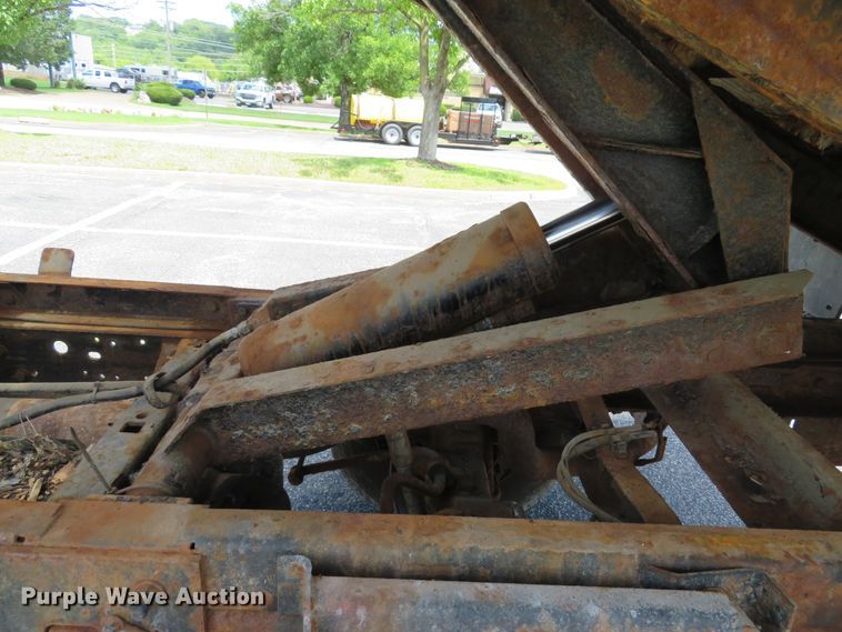 image for item DE8243 2005 Ford F450 Super Duty XL Crew Cab flat dump bed truck