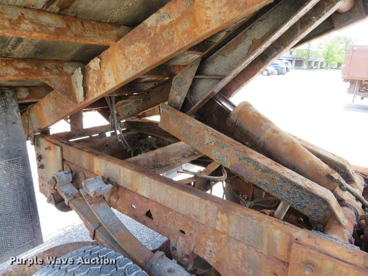 image for item DE8243 2005 Ford F450 Super Duty XL Crew Cab flat dump bed truck