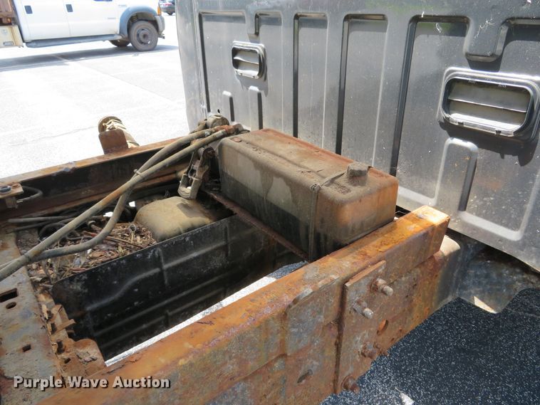 image for item DE8243 2005 Ford F450 Super Duty XL Crew Cab flat dump bed truck