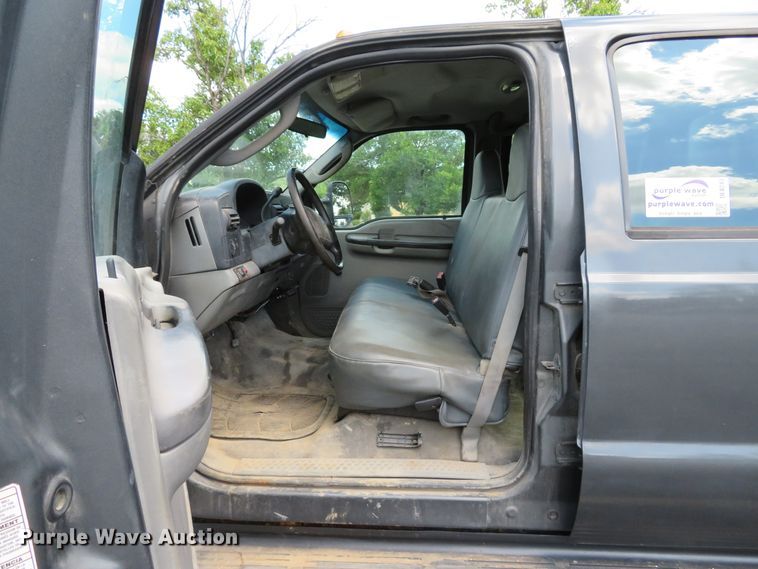 image for item DE8243 2005 Ford F450 Super Duty XL Crew Cab flat dump bed truck