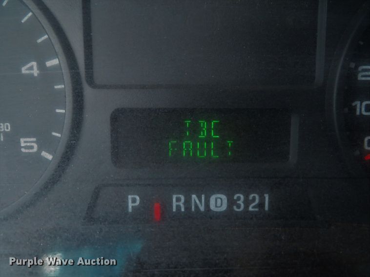 image for item DE8243 2005 Ford F450 Super Duty XL Crew Cab flat dump bed truck