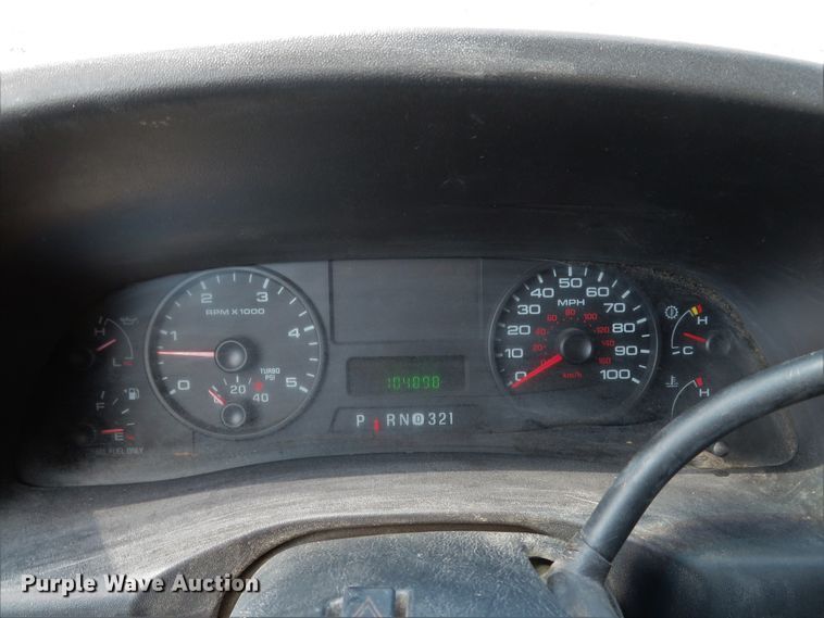 image for item DE8243 2005 Ford F450 Super Duty XL Crew Cab flat dump bed truck