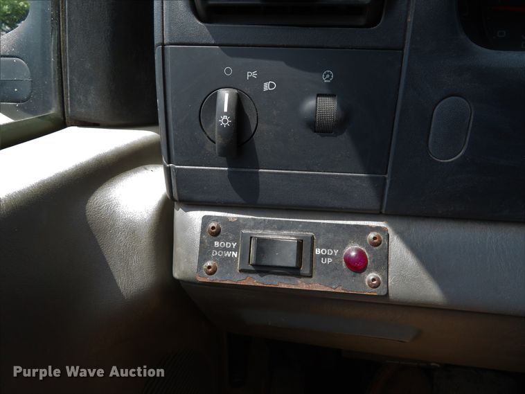 image for item DE8243 2005 Ford F450 Super Duty XL Crew Cab flat dump bed truck