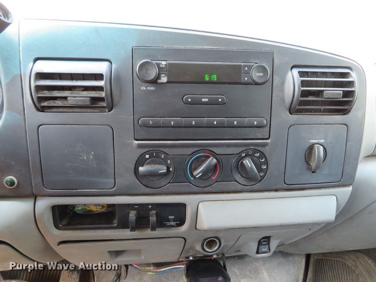 image for item DE8243 2005 Ford F450 Super Duty XL Crew Cab flat dump bed truck