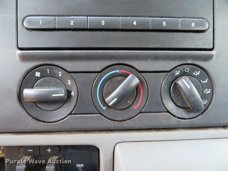 image for item DE8243 2005 Ford F450 Super Duty XL Crew Cab flat dump bed truck