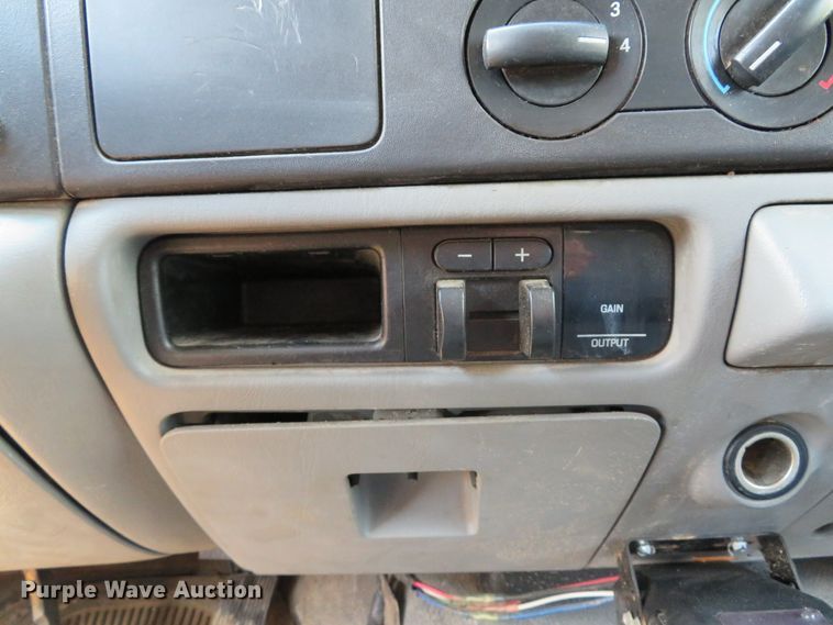 image for item DE8243 2005 Ford F450 Super Duty XL Crew Cab flat dump bed truck