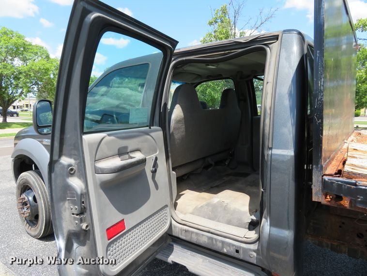 image for item DE8243 2005 Ford F450 Super Duty XL Crew Cab flat dump bed truck