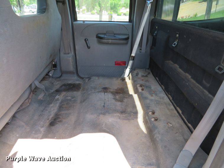 image for item DE8243 2005 Ford F450 Super Duty XL Crew Cab flat dump bed truck