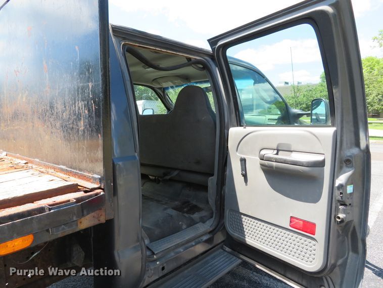 image for item DE8243 2005 Ford F450 Super Duty XL Crew Cab flat dump bed truck