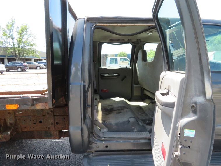 image for item DE8243 2005 Ford F450 Super Duty XL Crew Cab flat dump bed truck