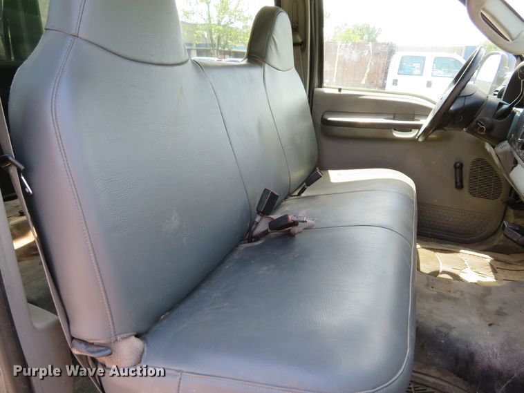 image for item DE8243 2005 Ford F450 Super Duty XL Crew Cab flat dump bed truck