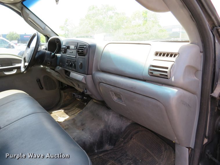 image for item DE8243 2005 Ford F450 Super Duty XL Crew Cab flat dump bed truck