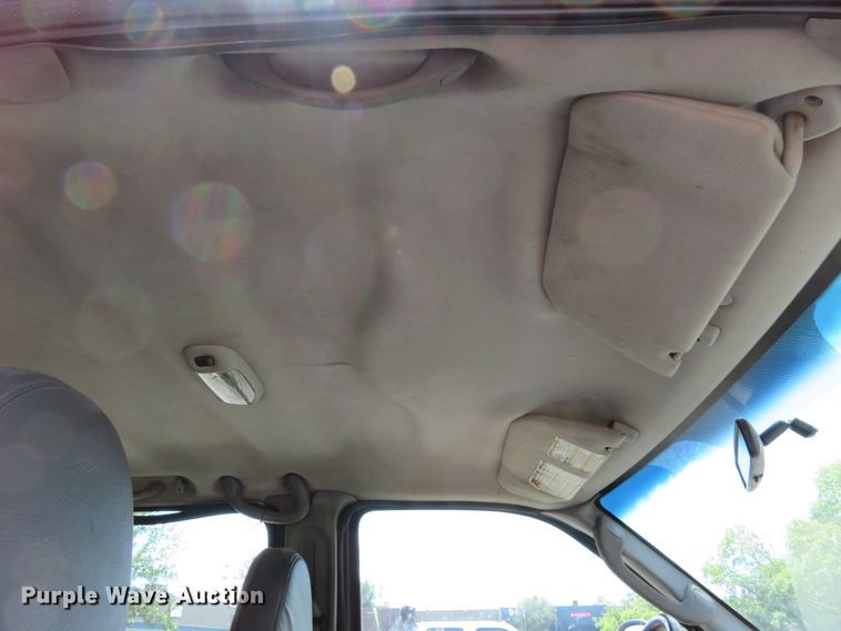 image for item DE8243 2005 Ford F450 Super Duty XL Crew Cab flat dump bed truck