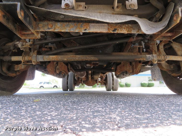 image for item DE8243 2005 Ford F450 Super Duty XL Crew Cab flat dump bed truck