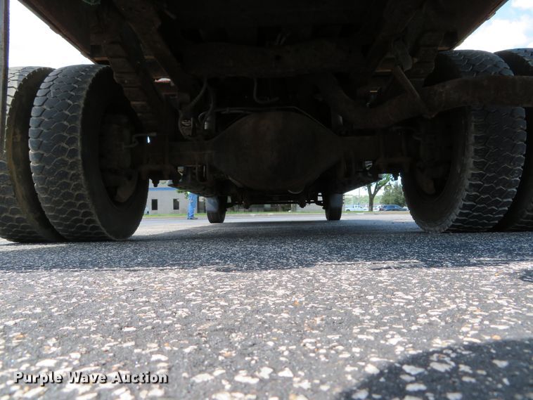 image for item DE8243 2005 Ford F450 Super Duty XL Crew Cab flat dump bed truck