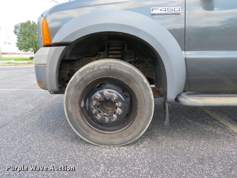 image for item DE8243 2005 Ford F450 Super Duty XL Crew Cab flat dump bed truck