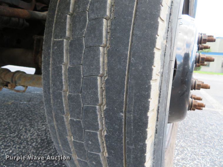 image for item DE8243 2005 Ford F450 Super Duty XL Crew Cab flat dump bed truck