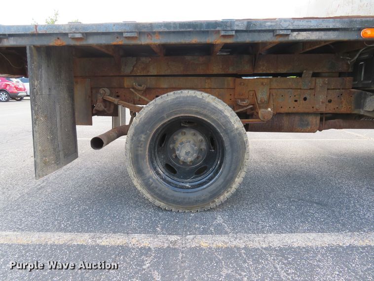 image for item DE8243 2005 Ford F450 Super Duty XL Crew Cab flat dump bed truck