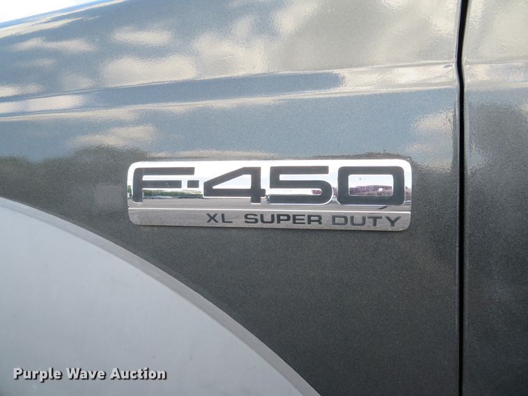 image for item DE8243 2005 Ford F450 Super Duty XL Crew Cab flat dump bed truck