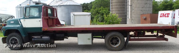 image for item EM9778 1989 Ford L8000 rollback truck