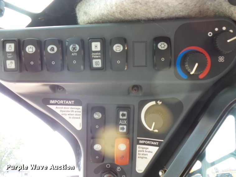 image for item FM9714 2012 John Deere 333D skid steer