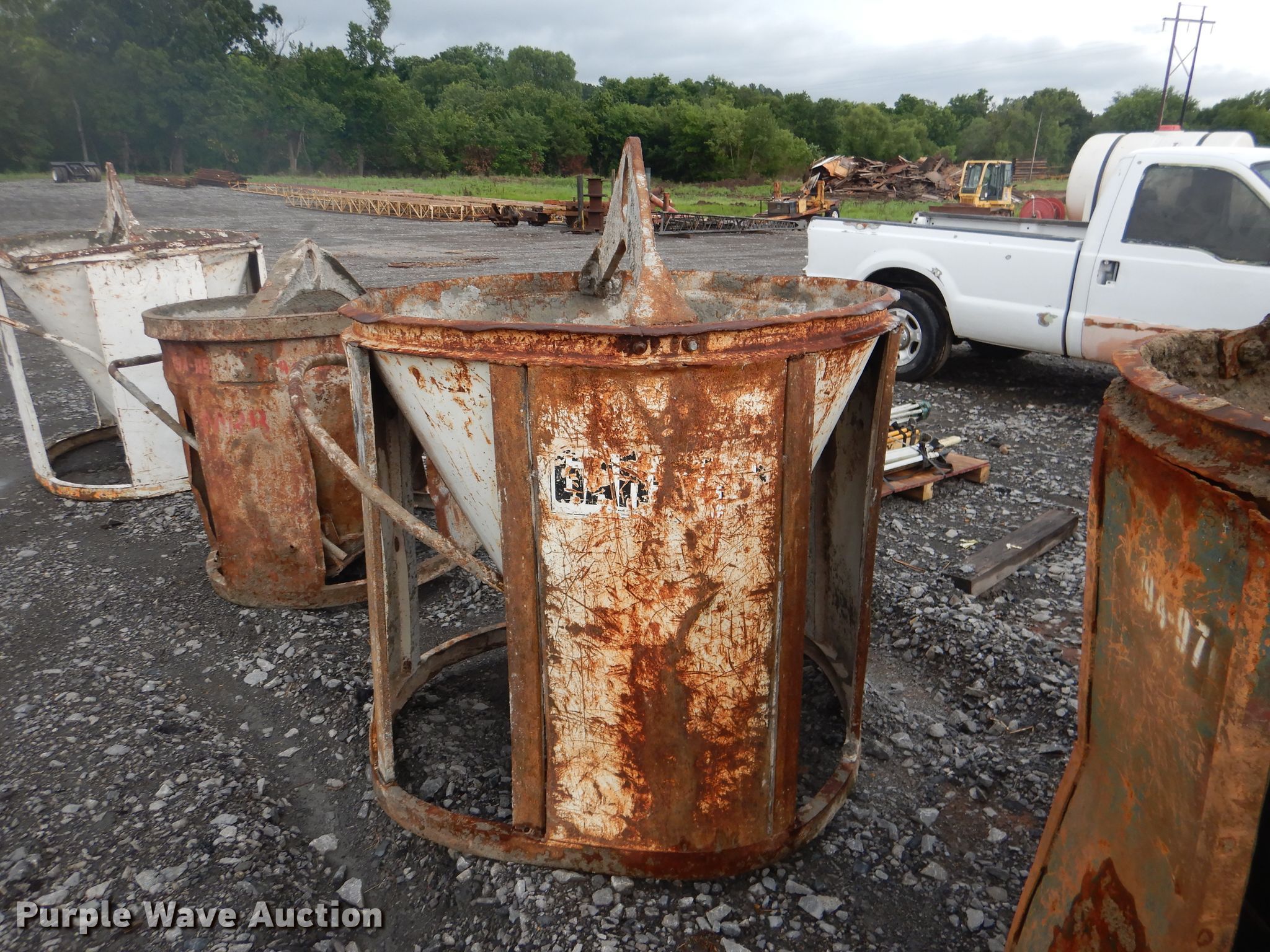 (4) round concrete buckets in Muskogee, OK Item DF2142 sold Purple Wave