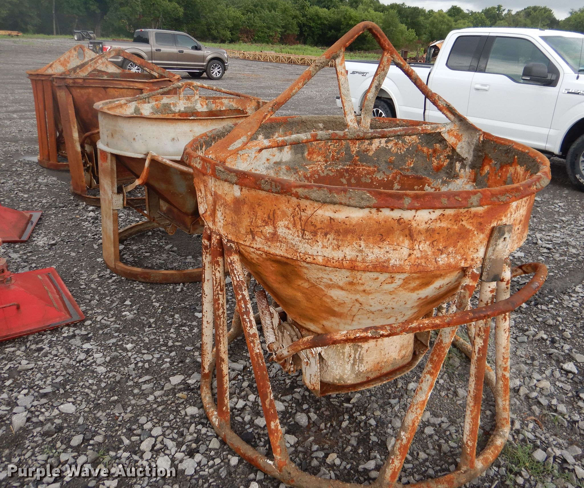 (4) round concrete buckets in Muskogee, OK Item DF2145 sold Purple Wave