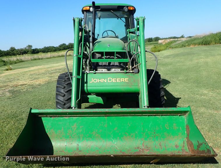 image for item DE5485 2005 John Deere 6615 MFWD tractor