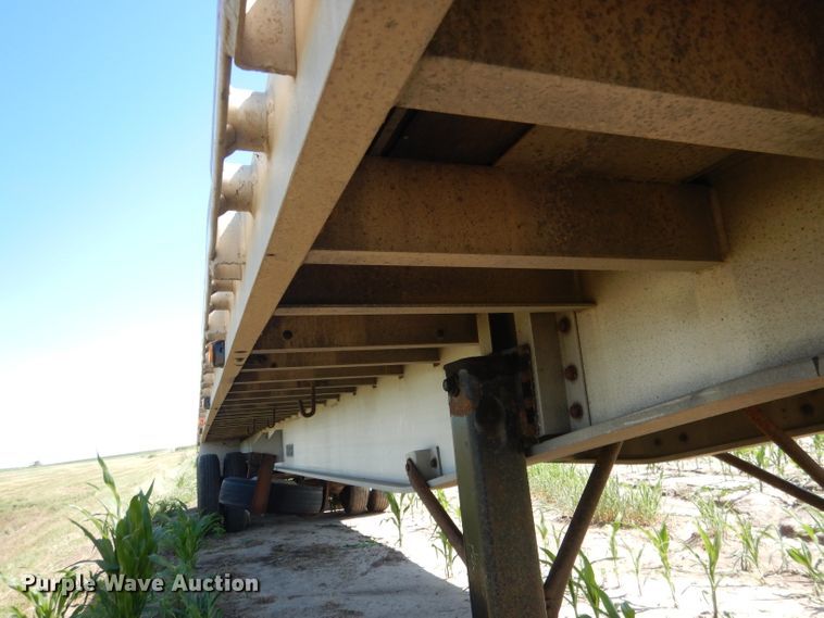 image for item DG5814 2004 Ravens AFTW58048WSAWI flatbed trailer