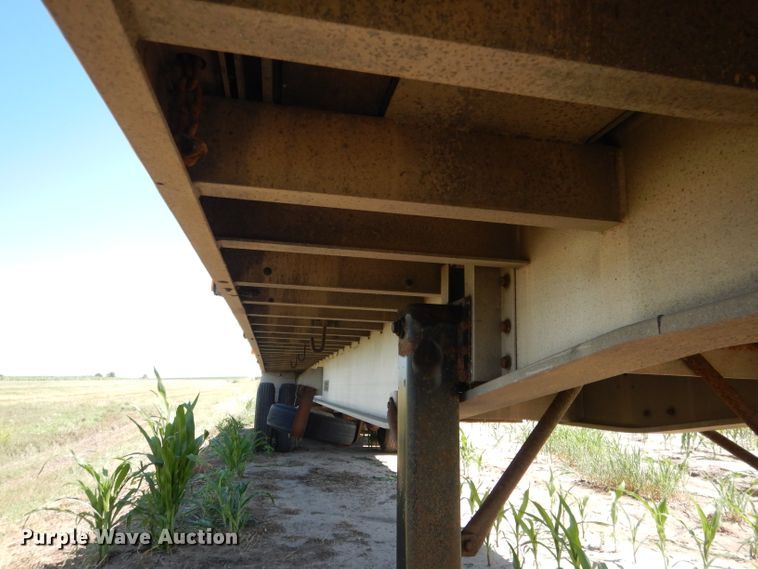 image for item DG5814 2004 Ravens AFTW58048WSAWI flatbed trailer