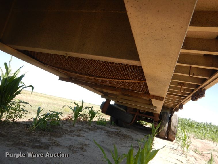 image for item DG5814 2004 Ravens AFTW58048WSAWI flatbed trailer