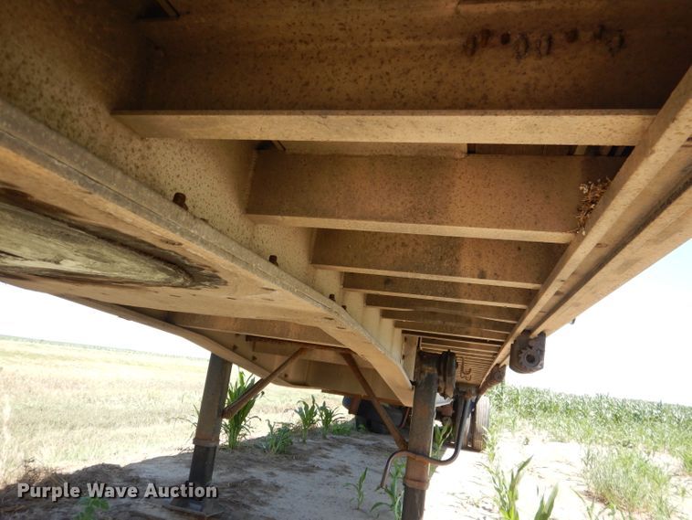 image for item DG5814 2004 Ravens AFTW58048WSAWI flatbed trailer