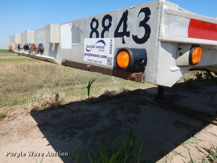 image for item DG5814 2004 Ravens AFTW58048WSAWI flatbed trailer