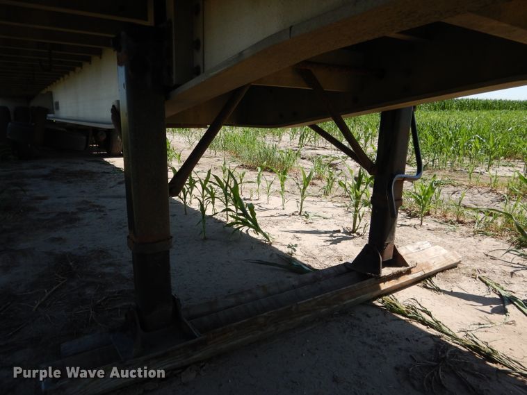 image for item DG5814 2004 Ravens AFTW58048WSAWI flatbed trailer