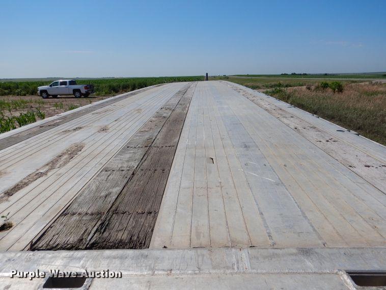 image for item DG5814 2004 Ravens AFTW58048WSAWI flatbed trailer