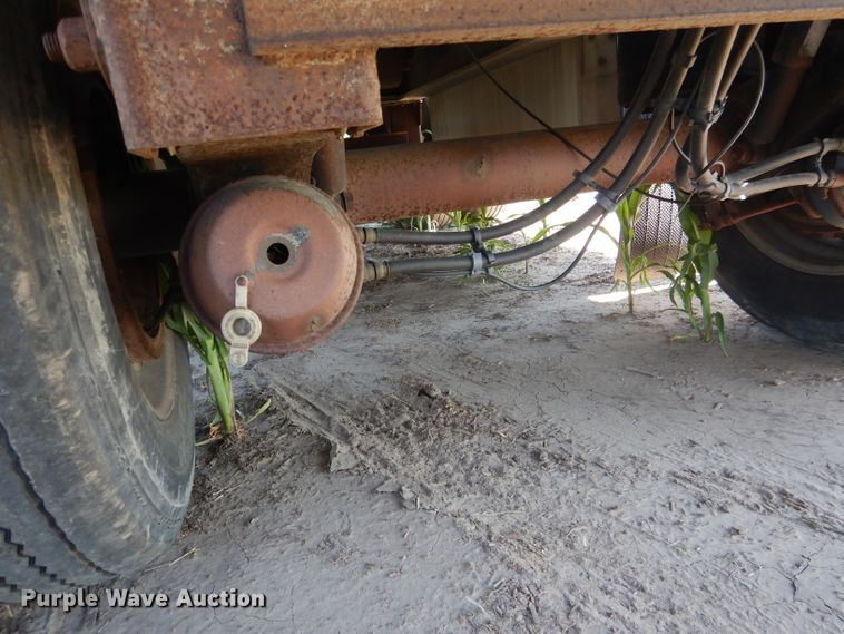 image for item DG5814 2004 Ravens AFTW58048WSAWI flatbed trailer