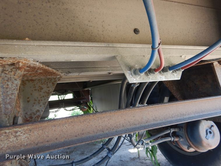 image for item DG5814 2004 Ravens AFTW58048WSAWI flatbed trailer