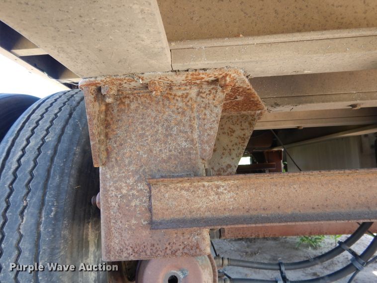 image for item DG5814 2004 Ravens AFTW58048WSAWI flatbed trailer