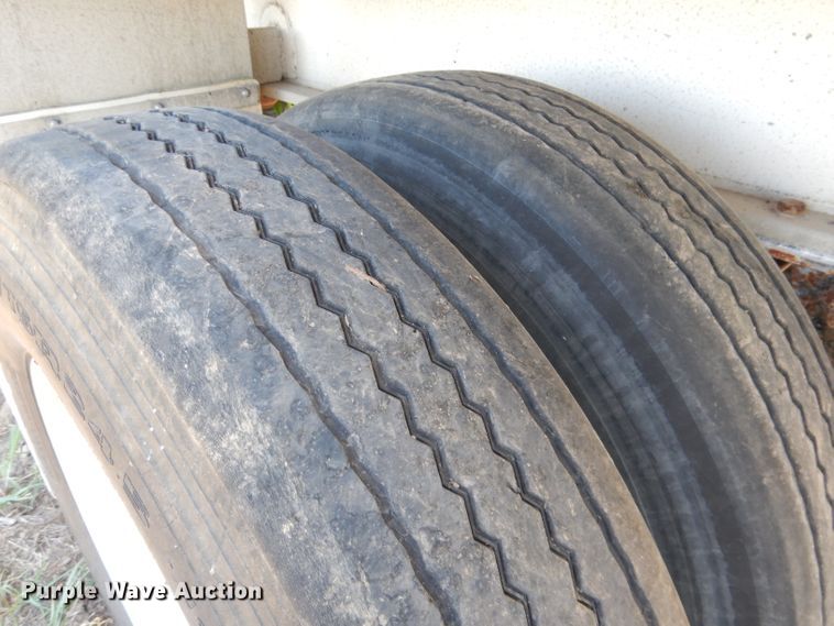 image for item DG5814 2004 Ravens AFTW58048WSAWI flatbed trailer