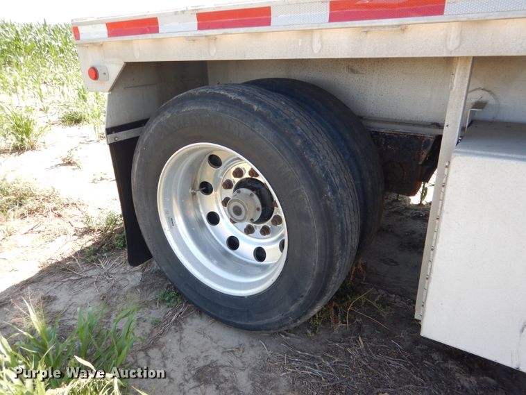 image for item DG5814 2004 Ravens AFTW58048WSAWI flatbed trailer