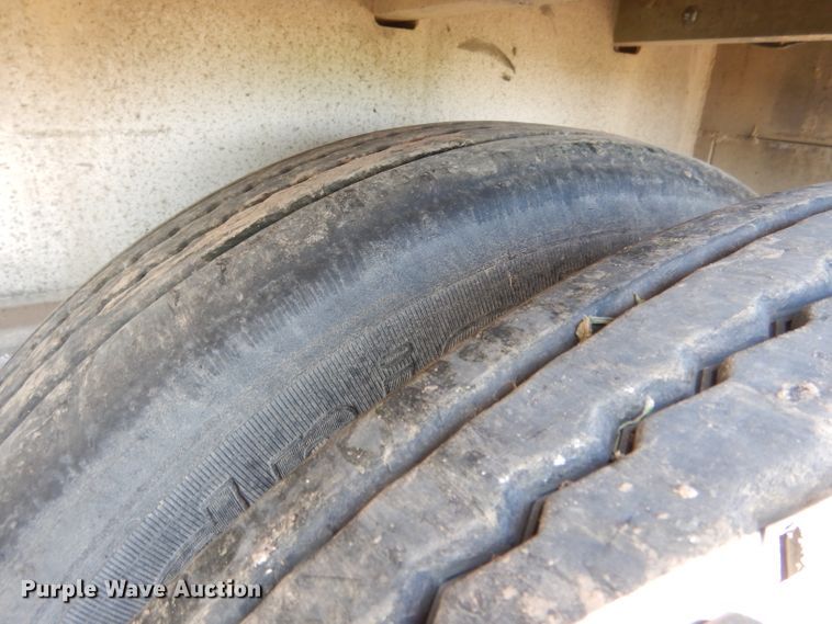 image for item DG5814 2004 Ravens AFTW58048WSAWI flatbed trailer