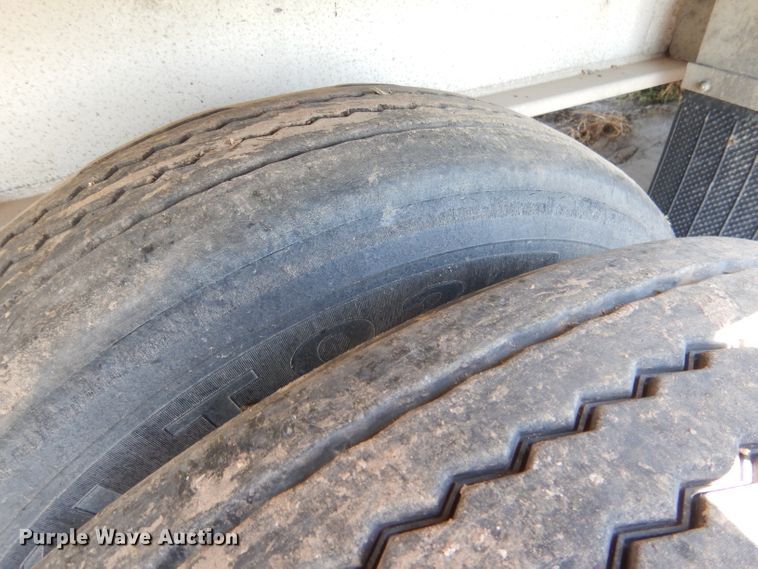 image for item DG5814 2004 Ravens AFTW58048WSAWI flatbed trailer