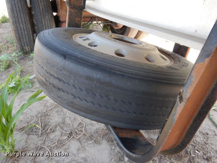 image for item DG5814 2004 Ravens AFTW58048WSAWI flatbed trailer