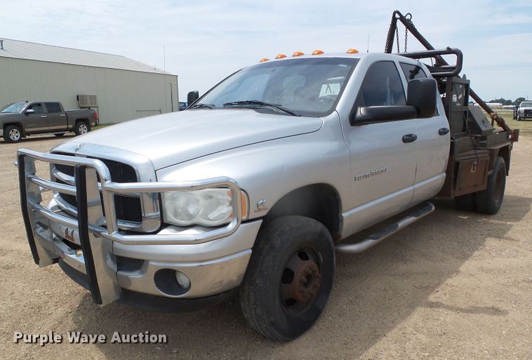 image for item DC5066 2005 Dodge Ram 3500 Quad Cab flatbed pickup truck