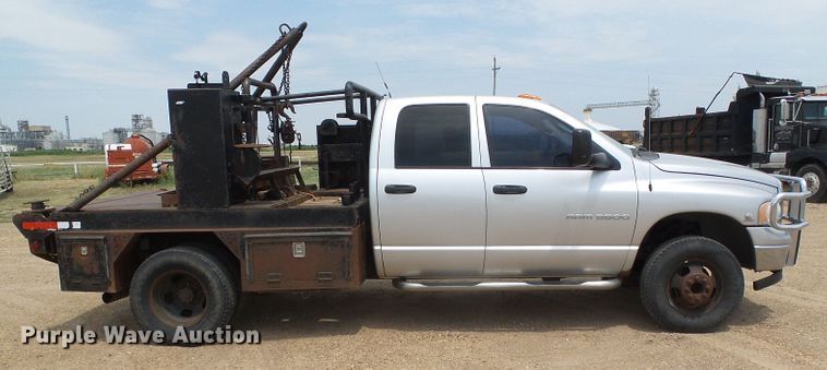 image for item DC5066 2005 Dodge Ram 3500 Quad Cab flatbed pickup truck
