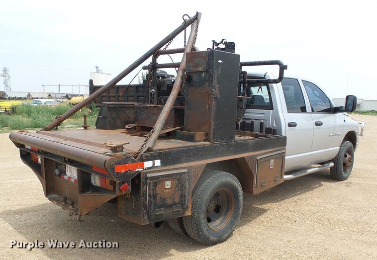 image for item DC5066 2005 Dodge Ram 3500 Quad Cab flatbed pickup truck