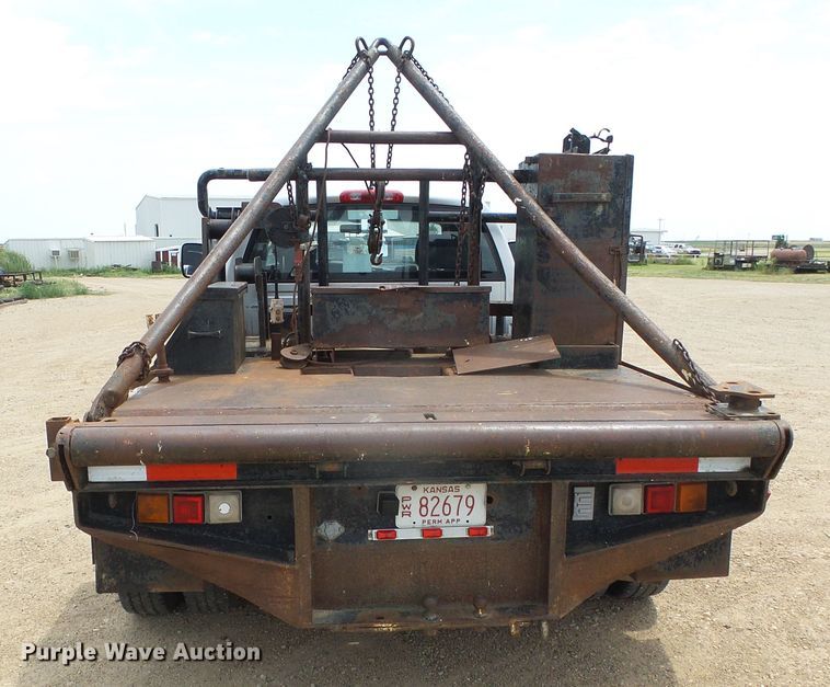 image for item DC5066 2005 Dodge Ram 3500 Quad Cab flatbed pickup truck