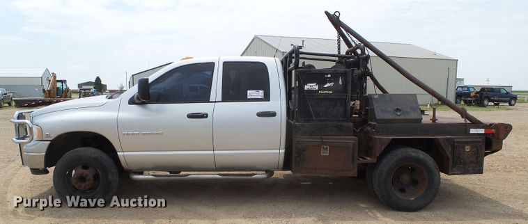 image for item DC5066 2005 Dodge Ram 3500 Quad Cab flatbed pickup truck