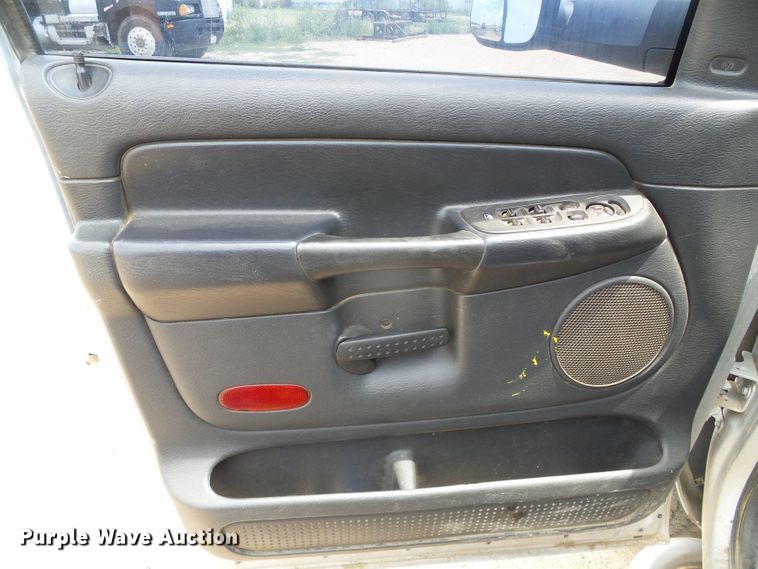 image for item DC5066 2005 Dodge Ram 3500 Quad Cab flatbed pickup truck